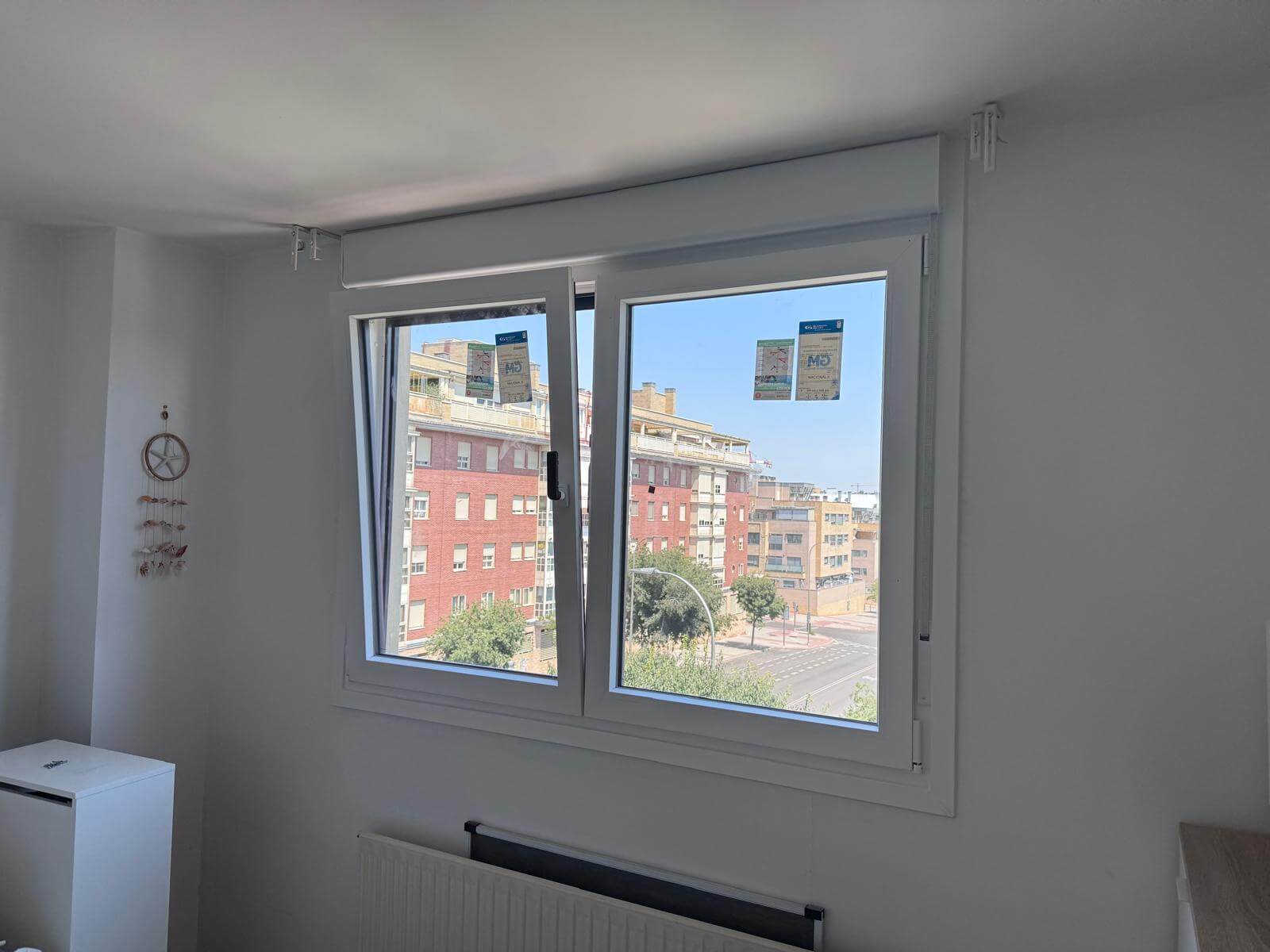 ventana oscilobatiente